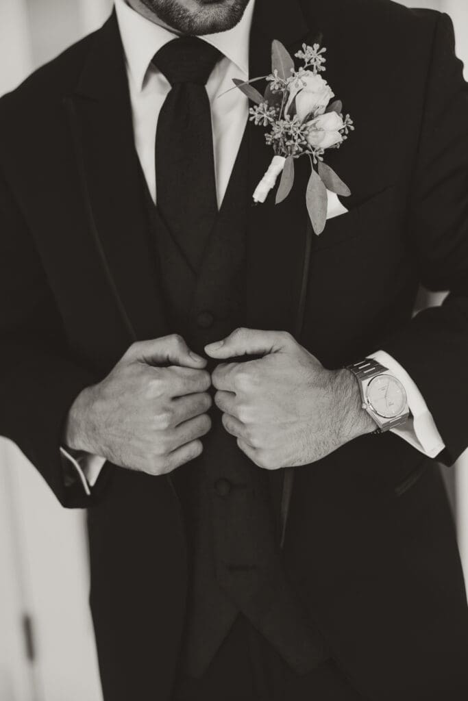 Luxury black and white portraits of  groom at Brookside Country Club
