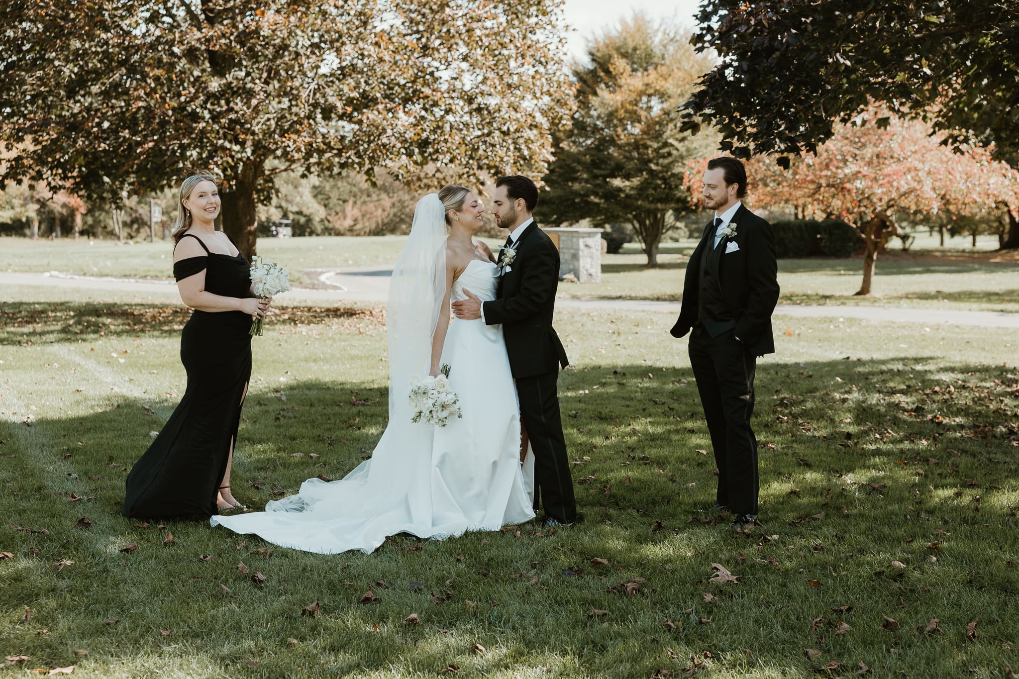Luxury wedding couple kiss at Brookside country club wedding.