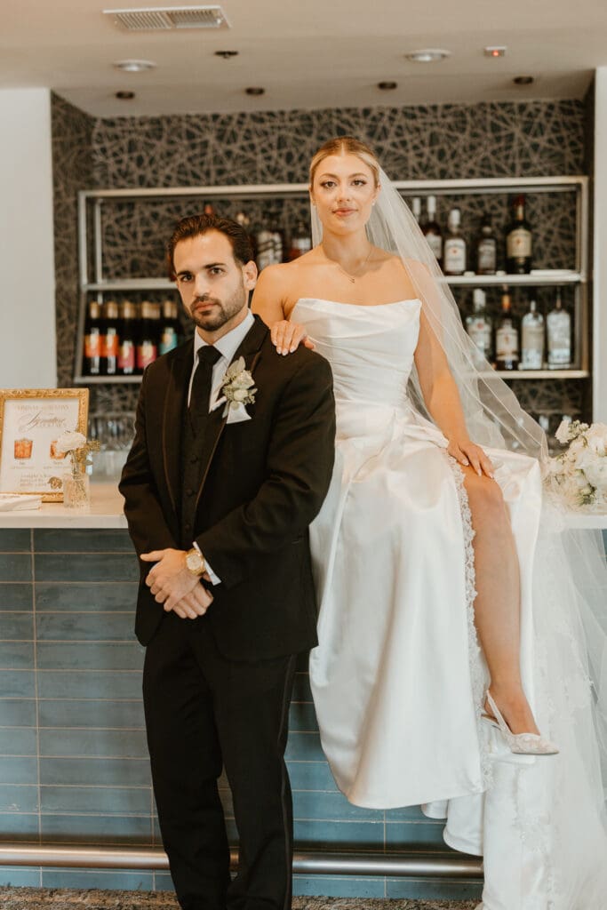 Luxury bride and groom bar portrait at Lehigh Valley country club wedding venue